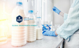 three bottles of milk and lab workers