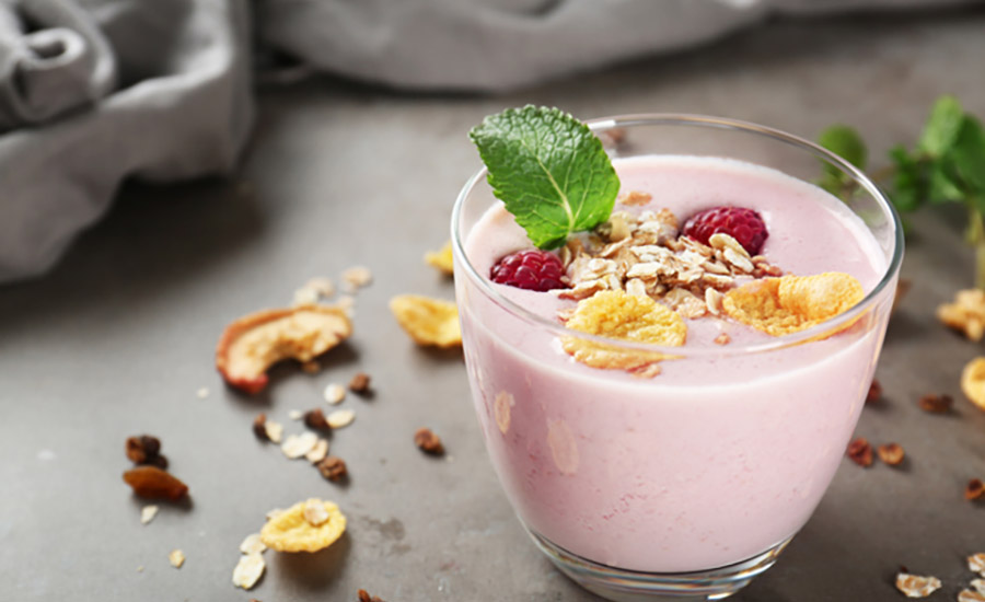 yogurt with berries and granola on top