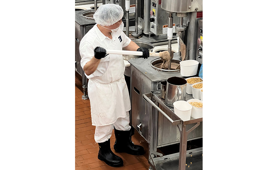 man churning ice cream