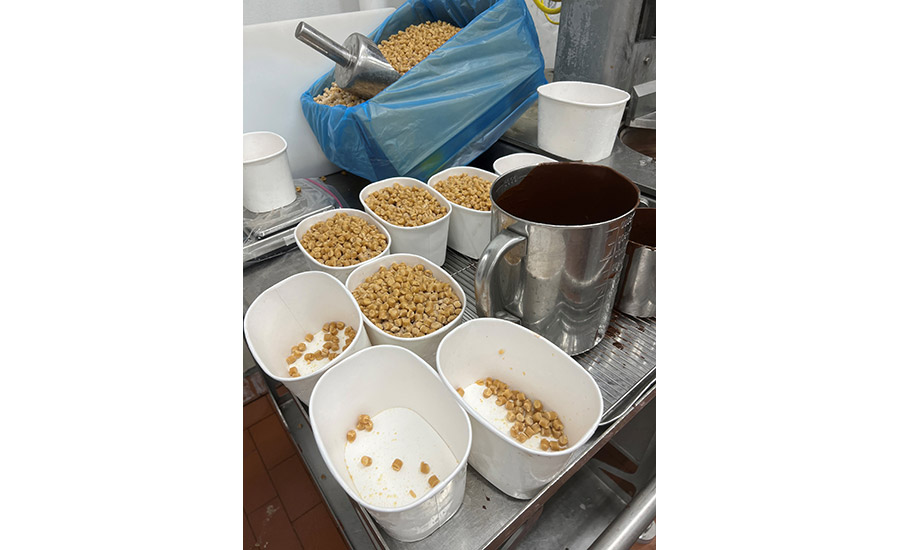 containers of chocolate and caramel