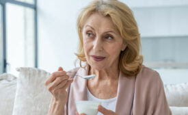 Woman Eating Yogurt